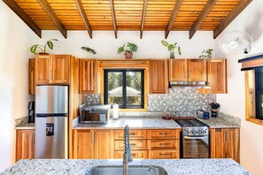Fridge, microwave, oven, stovetop - 4-Bedroom house w/ Pool, walk to West End Beaches and Dining.  Stunning Views! (West End)