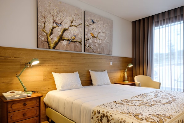 Deluxe Room | Premium bedding, minibar, individually decorated, individually furnished