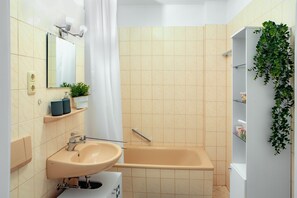 Hair dryer, towels, soap, shampoo