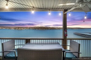 Outdoor dining - Beautiful Main Channel View Cozy Condo in the HEART of Osage Beach! Boat Slip! (Osage Beach)