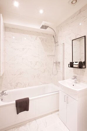 Shower, hair dryer - Avari - Luxury 2BR Apartment • Steps from Victoria (London)
