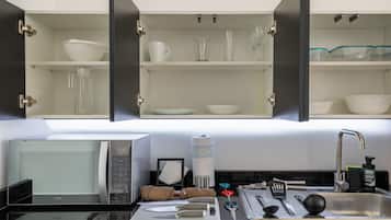 Signature Apartment | Private kitchen | Full-size fridge, microwave, stovetop, espresso maker