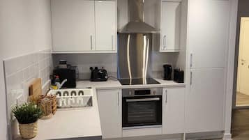 Apartment, 2 Queen Beds | Private kitchen | Fridge, microwave, oven, stovetop