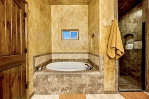 Jetted tub, hair dryer, towels, soap