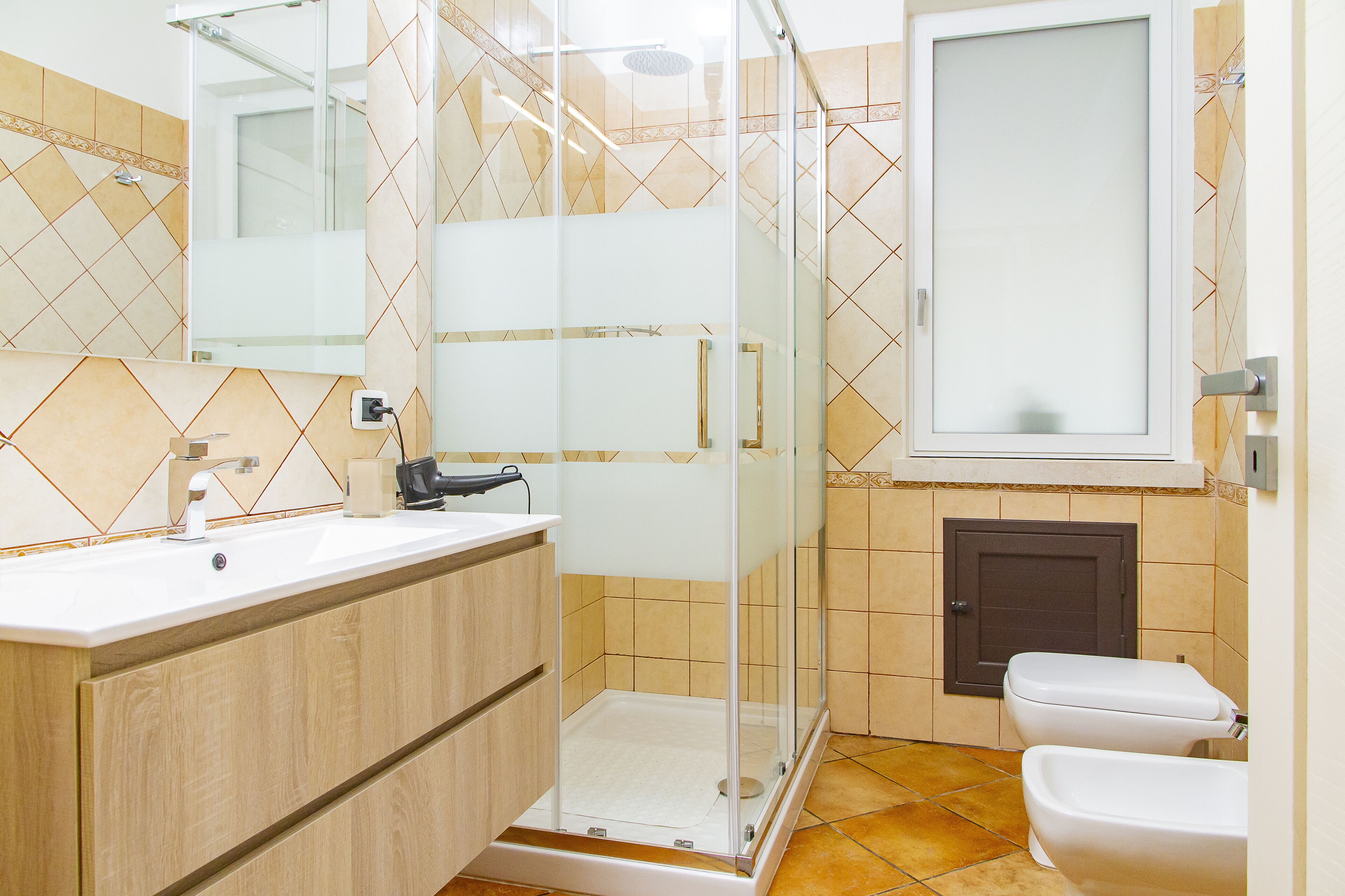 Hair dryer, bidet, towels, soap