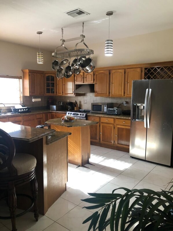 Fridge, microwave, stovetop, coffee/tea maker - Beautiful family vacation home in the Bahamas. (Freeport)