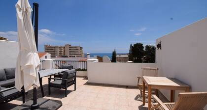 Ref 290: Townhouse with roof terrace ,pool sea view,& easy walk to the beach.