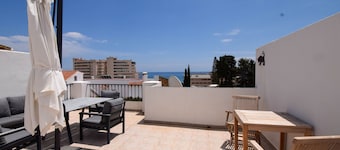 Ref 290: Townhouse with roof terrace ,pool sea view,& easy walk to the beach.