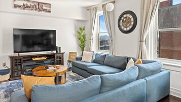 Smart TV, fireplace, books