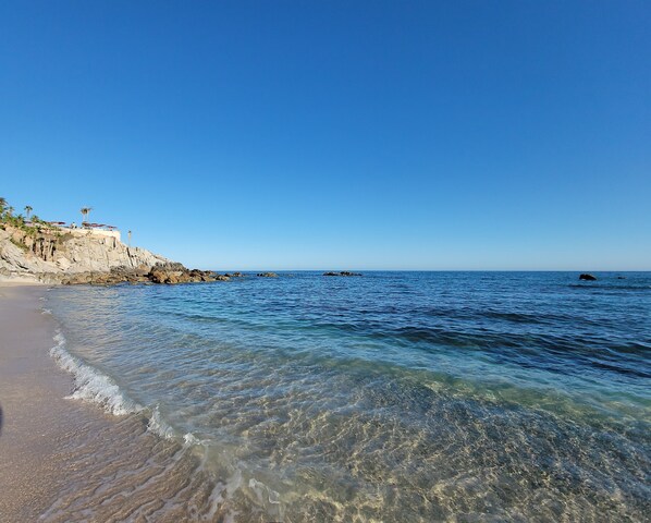 On the beach, sun loungers, beach towels