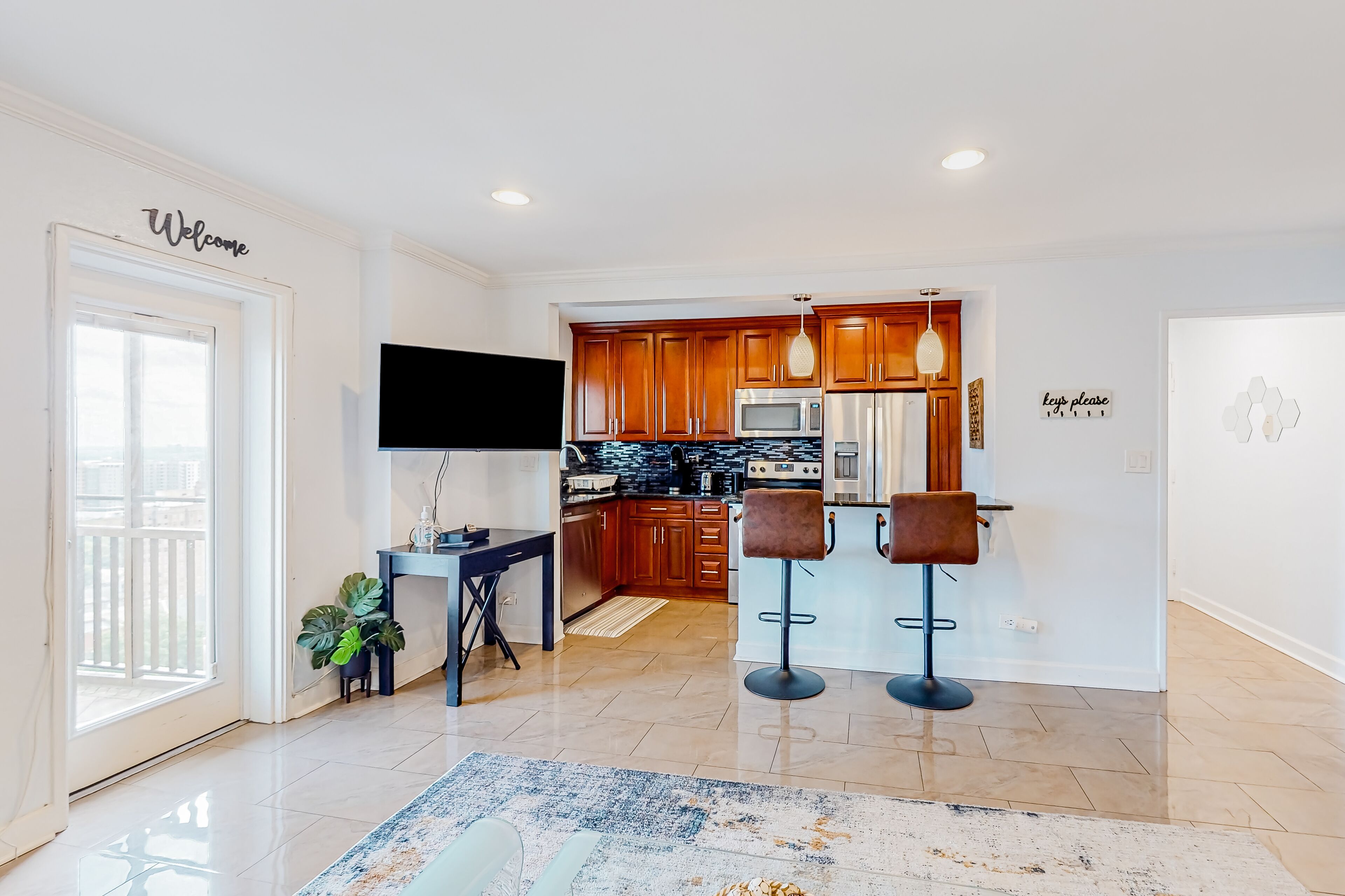 High rise condo with excellent city views, balcony, & AC - wheelchair accessible