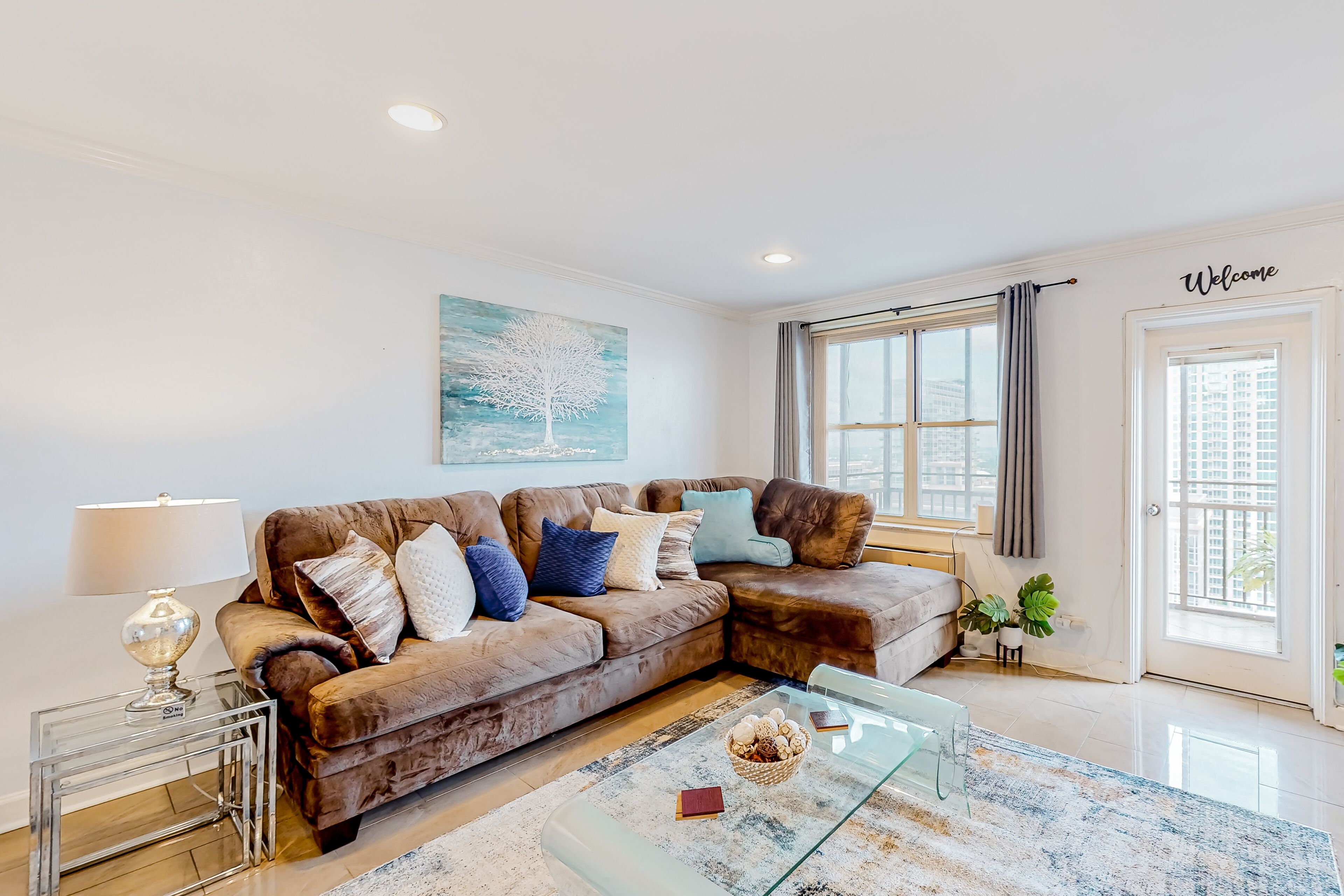 High rise condo with excellent city views, balcony, & AC - wheelchair accessible