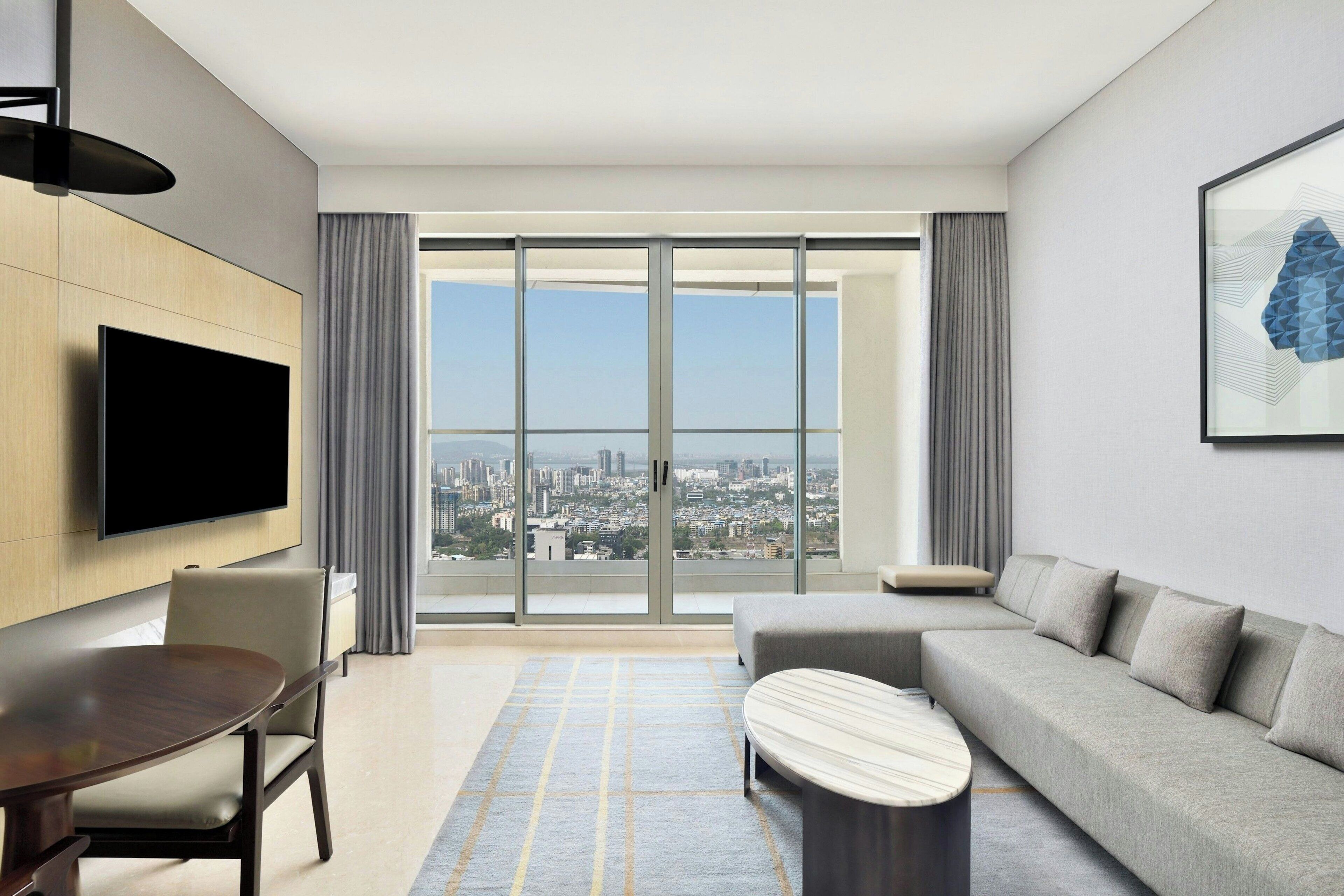 Luxury Room, 1 Bedroom, Balcony (view) | Living room | 56-inch LCD TV with cable channels, TV