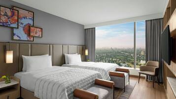 Roupas de cama premium, edredons de pluma, frigobar, cofres nos quartos