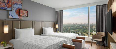 Premium bedding, down comforters, minibar, in-room safe