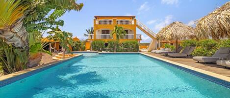 Outdoor pool, pool umbrellas, sun loungers