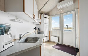 Frigorifero, piano cottura, lavastoviglie, macchina per tè/caffè