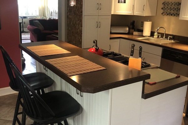 Kitchen island with gas stove.
