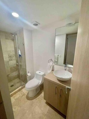 Hair dryer, towels, soap, toilet paper