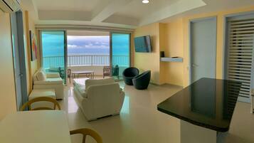 Standard Apartment | Living area | 32-inch LCD TV with cable channels, TV, heated floors
