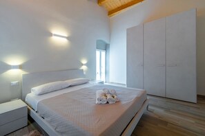 2 habitaciones, tabla de planchar con plancha y internet 