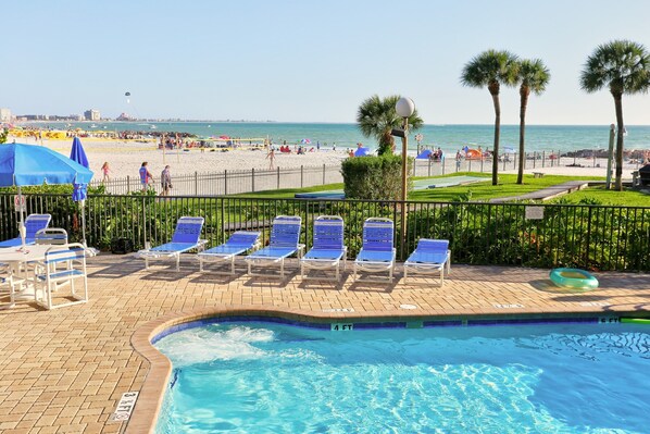 A heated pool - 🌴 Caprice Resort Unit #206 – Gulf Front Comfort for Up to Four Guests (Saint Pete Beach)