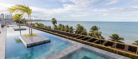 Basic Apartment | Pool | Outdoor pool, pool umbrellas