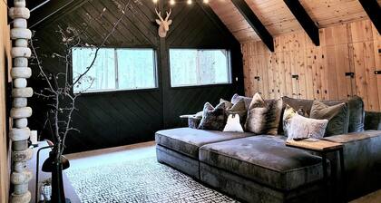 Dala Haus, nestled along side a private forest.