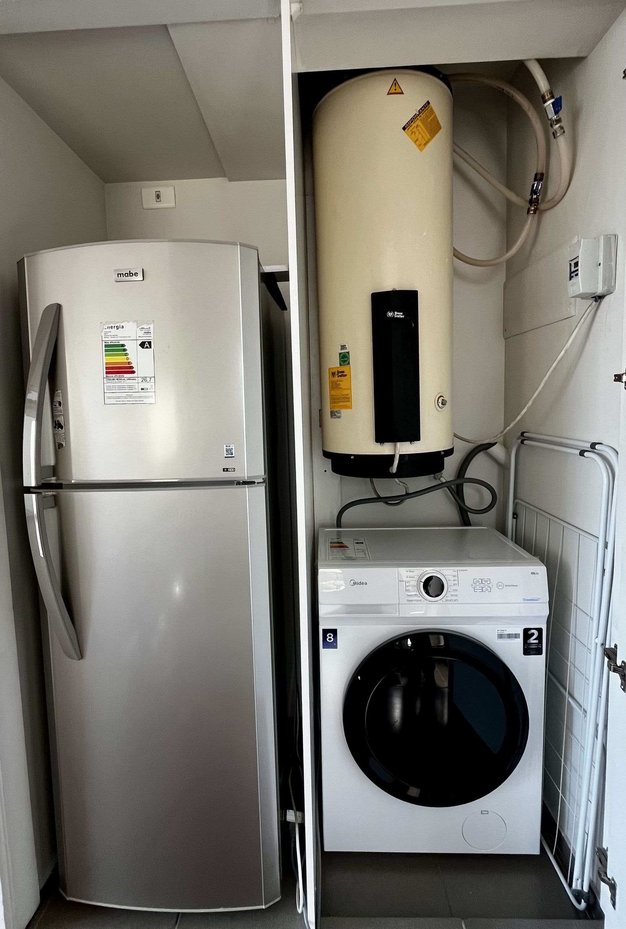 Refrigerator, water heater and washing machine in the utility closet