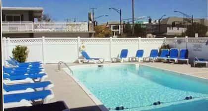 Central Location -- Short walk to Beach/Boardwalk w/ parking and heated pool!