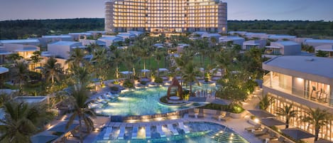 2 outdoor pools, pool umbrellas, pool loungers