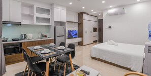 Design Studio, City View | Living room | 49-inch TV with cable channels - Luxury Apartment Dcapital Tran Duy Hung (Hanoi)