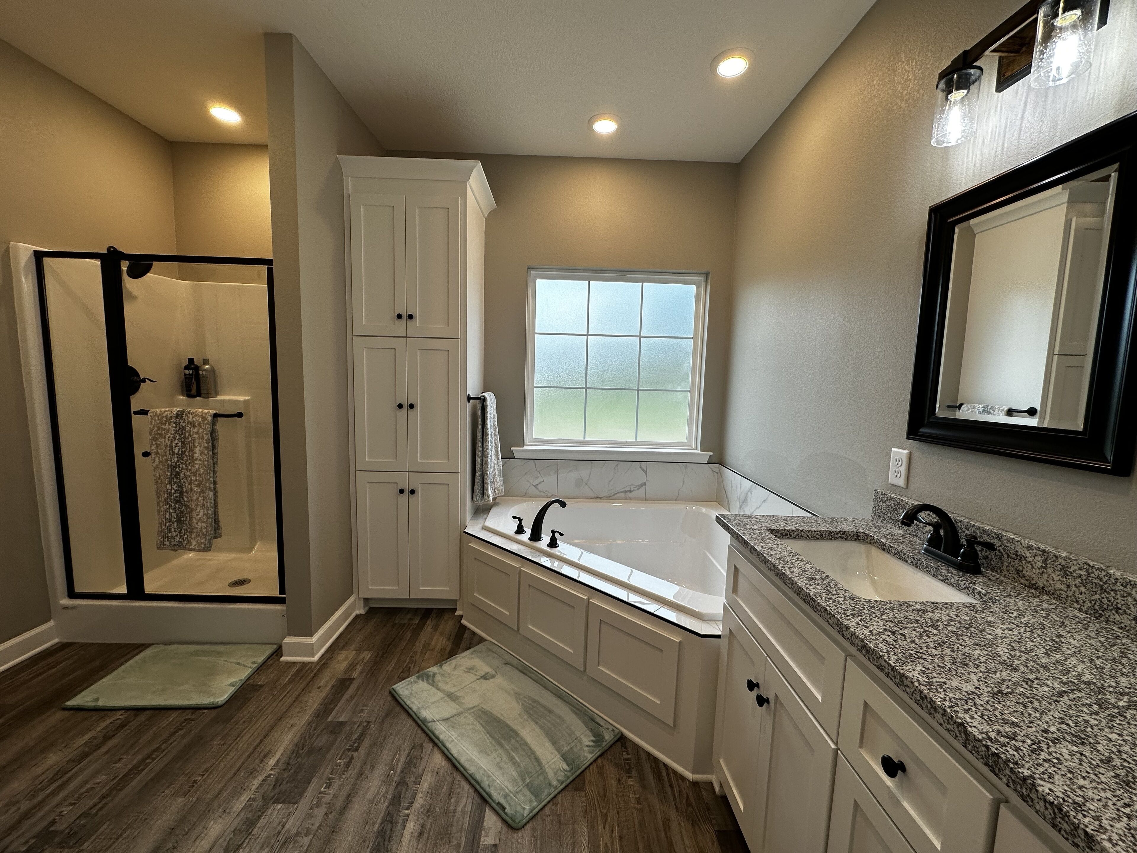 Jetted tub, hair dryer, towels, soap