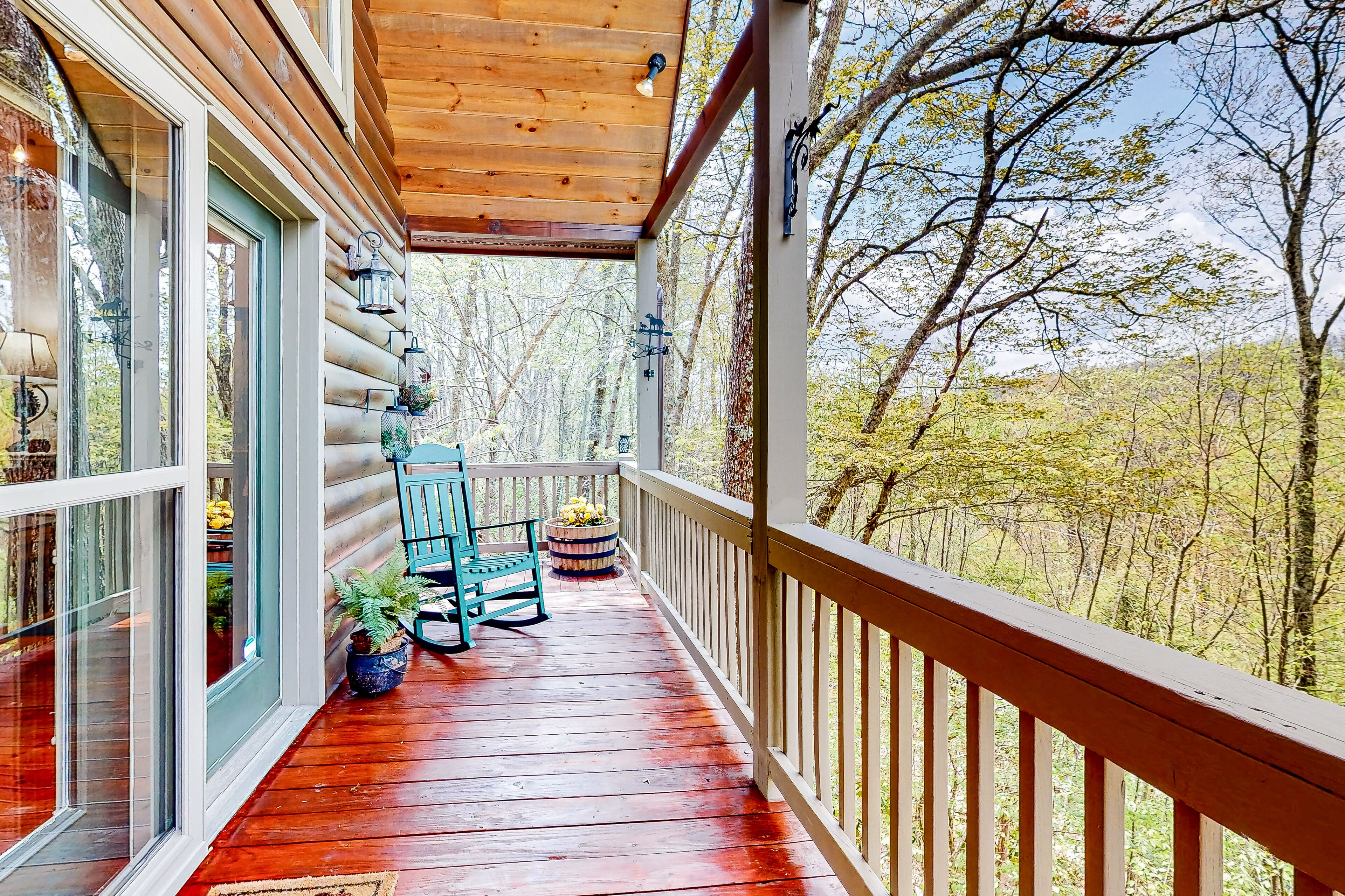 Private retreat amongst the trees with a deck, firepit, grill, AC, and W/D