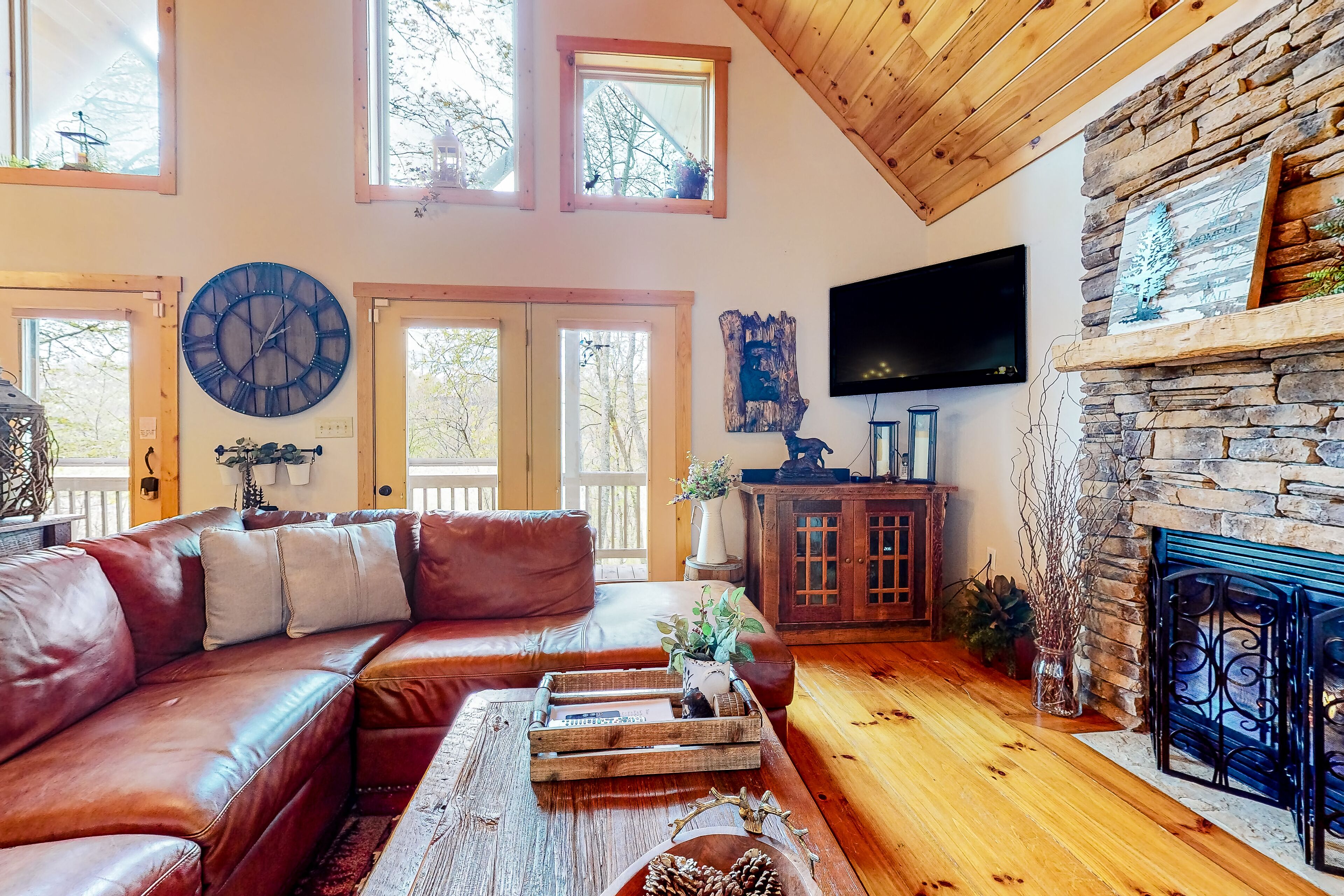 Private retreat amongst the trees with a deck, firepit, grill, AC, and W/D