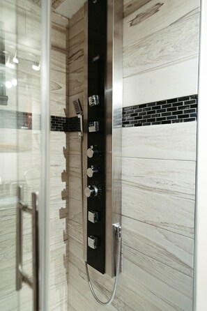 Shower, hair dryer, towels, soap
