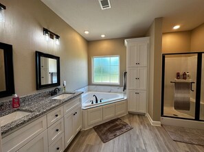 Jetted bath, hair dryer, towels, soap