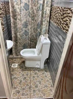 Shower, towels, soap, shampoo