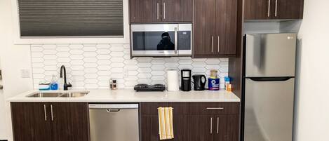Fridge, microwave, dishwasher, coffee/tea maker