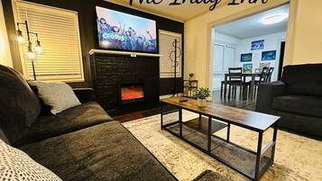 TV, fireplace, books, offices