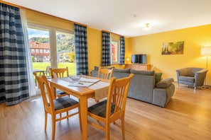 Condo, 1 Queen Bed with Sofa bed, Non Smoking, Patio | Living area | 40-inch flat-screen TV with cable channels, TV, heated floors - Hotelpark Bodetal (Thale)