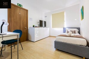 1 bedroom, desk, iron/ironing board, travel cot