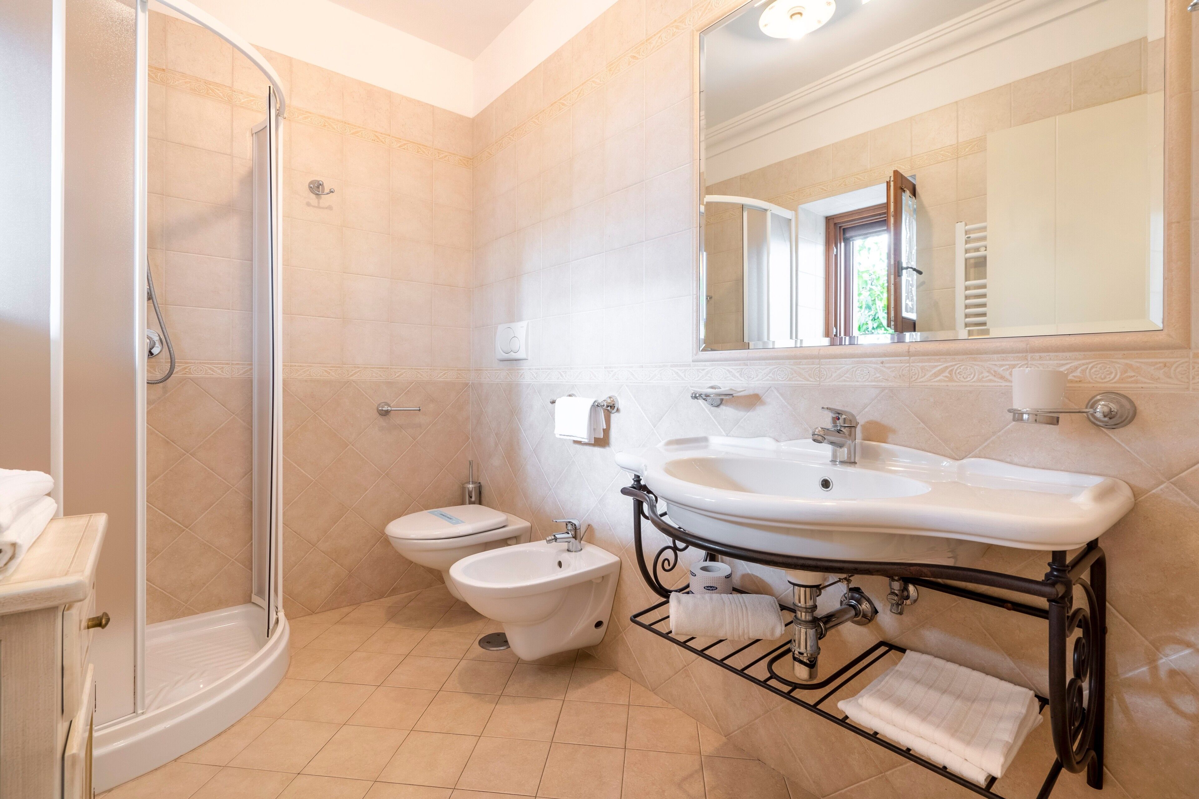 Shower, free toiletries, hair dryer, towels