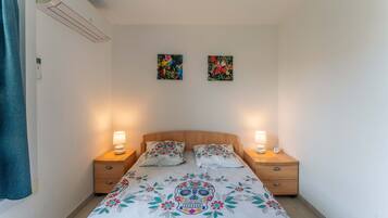 2 slaapkamers, een strijkplank/strijkijzer, gratis wifi, beddengoed