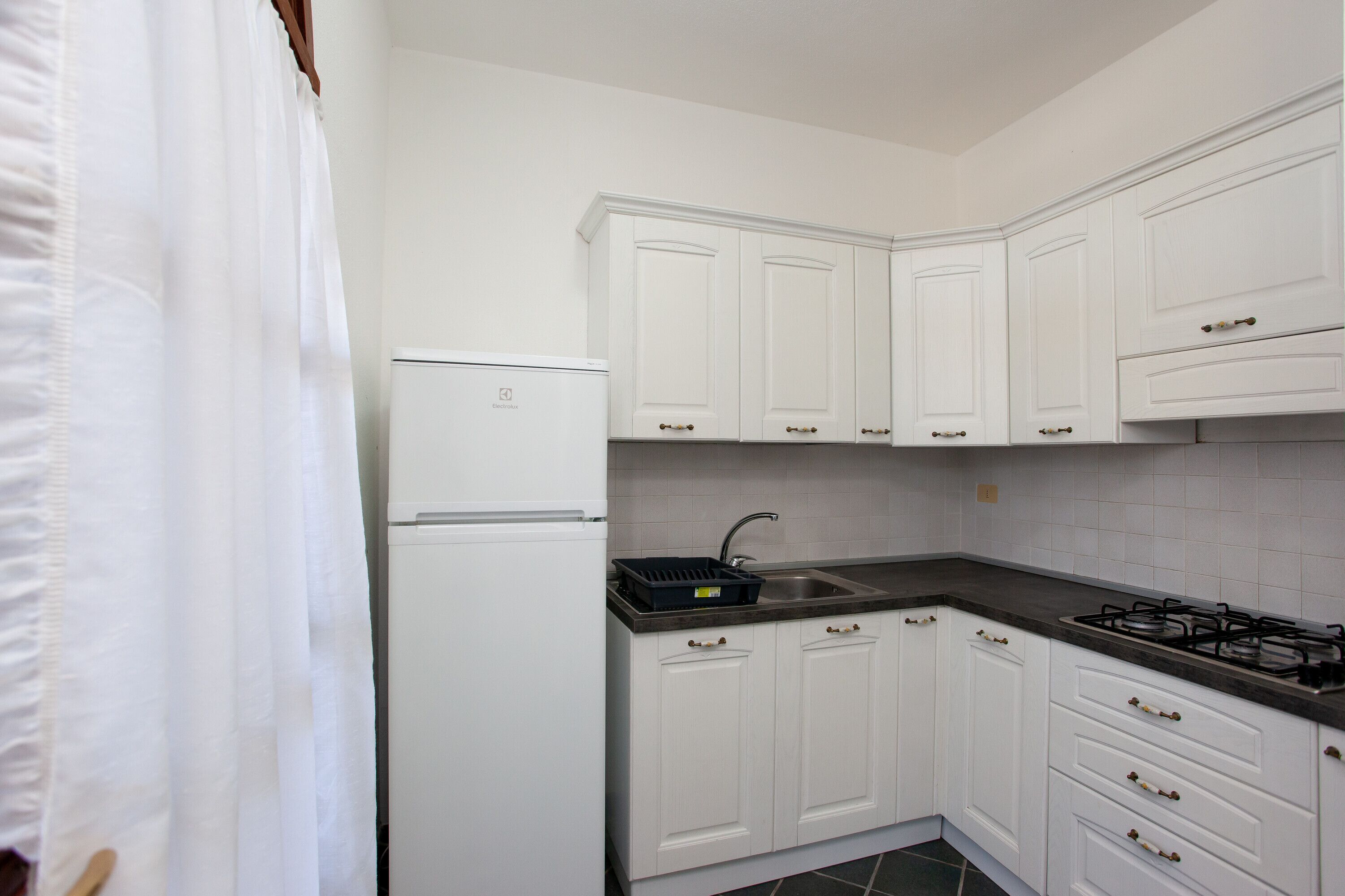 Vacation Home "Villetta 4 Camere Con Vista" with Sea View, Private Terrace & Shared Garden