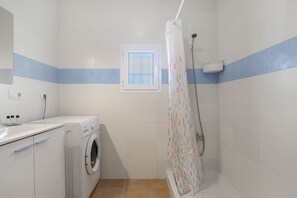 Een douche, een haardroger