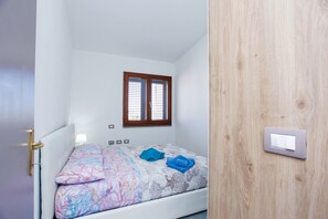 2 quartos, ferros/tábuas de passar roupa, Wi-Fi de cortesia