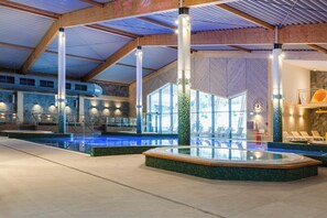 Indoor pool, open 8:00 AM to 10:00 PM, pool loungers, lifeguards on site