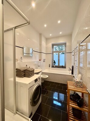 Hair dryer, towels, soap, shampoo