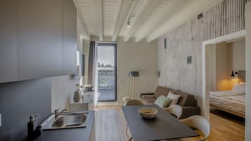 Premium Apartment | Living area | 32-inch flat-screen TV with digital channels, TV